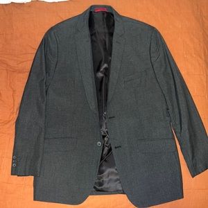 Black with red highlights men’s Sport coat. Size Large Slim Fit. Never worn.
